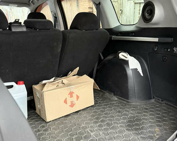 Синий Мицубиси Аутлендер, объемом двигателя 2.36 л и пробегом 269 тыс. км за 7500 $, фото 10 на Automoto.ua