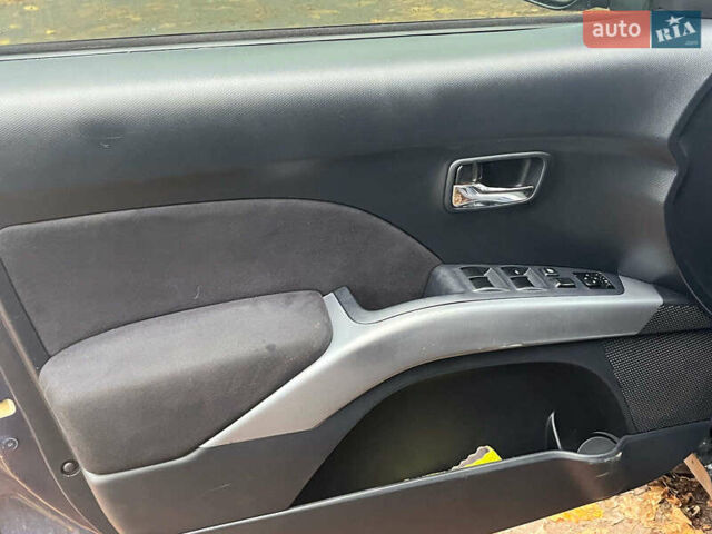 Синій Міцубісі Аутлендер, об'ємом двигуна 2.4 л та пробігом 211 тис. км за 8390 $, фото 27 на Automoto.ua