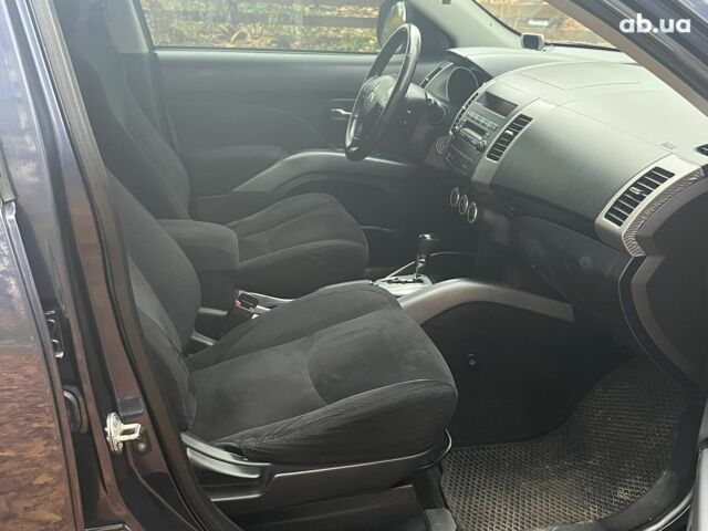 Синій Міцубісі Аутлендер, об'ємом двигуна 2.4 л та пробігом 211 тис. км за 8390 $, фото 15 на Automoto.ua