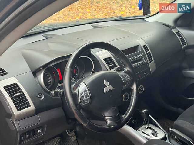 Синій Міцубісі Аутлендер, об'ємом двигуна 2.4 л та пробігом 211 тис. км за 8390 $, фото 31 на Automoto.ua