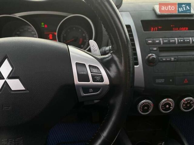 Синій Міцубісі Аутлендер, об'ємом двигуна 2.36 л та пробігом 282 тис. км за 9490 $, фото 30 на Automoto.ua