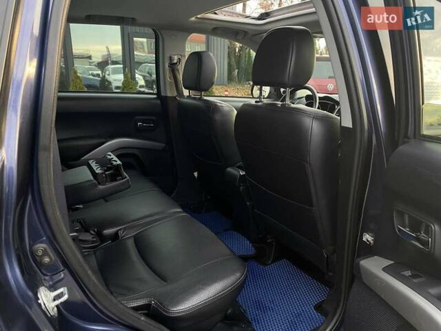 Синій Міцубісі Аутлендер, об'ємом двигуна 2.36 л та пробігом 282 тис. км за 9490 $, фото 26 на Automoto.ua