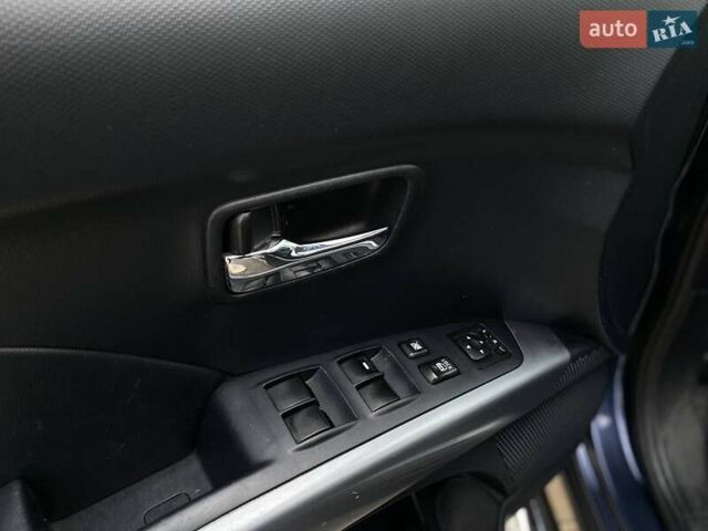 Синій Міцубісі Аутлендер, об'ємом двигуна 2.36 л та пробігом 282 тис. км за 9490 $, фото 18 на Automoto.ua