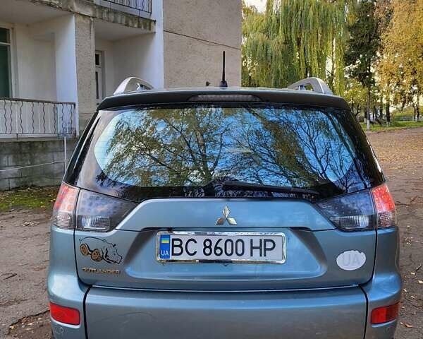 Мицубиси Аутлендер 2008 в Тернополе на Automoto.ua Синий Мицубиси Аутлендер, объемом двигателя 2.36 л и пробегом 264 тыс. км за 7500 $, фото 3 на Automoto.ua
