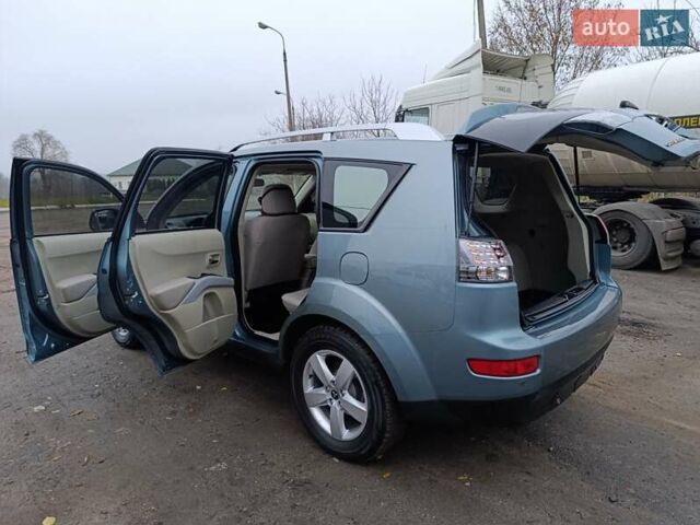 Синий Мицубиси Аутлендер, объемом двигателя 2.4 л и пробегом 264 тыс. км за 7555 $, фото 13 на Automoto.ua