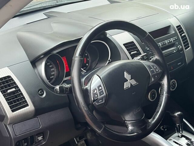 Синій Міцубісі Аутлендер, об'ємом двигуна 2.4 л та пробігом 211 тис. км за 8390 $, фото 29 на Automoto.ua