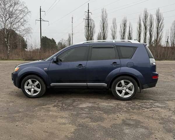 Синий Мицубиси Аутлендер, объемом двигателя 2.4 л и пробегом 211 тыс. км за 7800 $, фото 22 на Automoto.ua