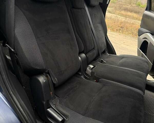 Синий Мицубиси Аутлендер, объемом двигателя 2.4 л и пробегом 211 тыс. км за 7800 $, фото 7 на Automoto.ua