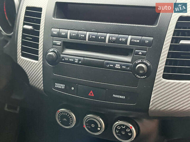 Синій Міцубісі Аутлендер, об'ємом двигуна 2.4 л та пробігом 211 тис. км за 8390 $, фото 18 на Automoto.ua