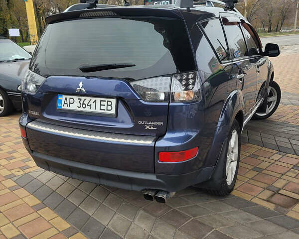 Синий Мицубиси Аутлендер, объемом двигателя 3 л и пробегом 270 тыс. км за 7900 $, фото 7 на Automoto.ua