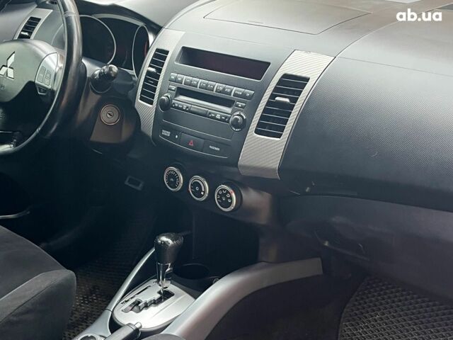 Синій Міцубісі Аутлендер, об'ємом двигуна 2.4 л та пробігом 211 тис. км за 8390 $, фото 16 на Automoto.ua