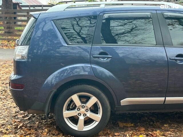 Синій Міцубісі Аутлендер, об'ємом двигуна 2.4 л та пробігом 211 тис. км за 8390 $, фото 12 на Automoto.ua