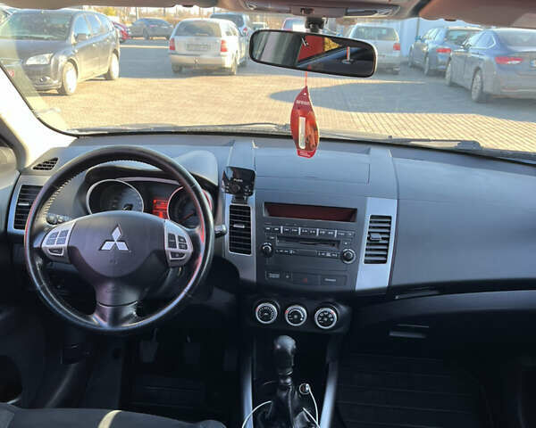 Синий Мицубиси Аутлендер, объемом двигателя 2 л и пробегом 263 тыс. км за 8900 $, фото 26 на Automoto.ua