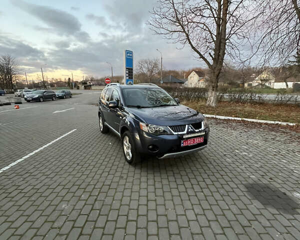 Синий Мицубиси Аутлендер, объемом двигателя 2 л и пробегом 263 тыс. км за 8900 $, фото 14 на Automoto.ua