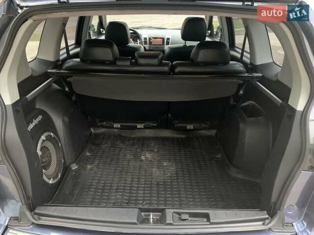 Синий Мицубиси Аутлендер, объемом двигателя 3 л и пробегом 383 тыс. км за 9000 $, фото 7 на Automoto.ua