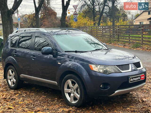 Синій Міцубісі Аутлендер, об'ємом двигуна 2.4 л та пробігом 211 тис. км за 8390 $, фото 3 на Automoto.ua