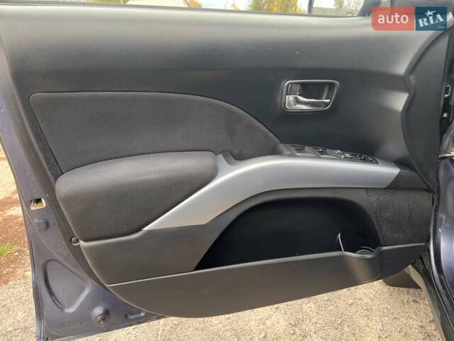 Синий Мицубиси Аутлендер, объемом двигателя 2.4 л и пробегом 94 тыс. км за 8800 $, фото 12 на Automoto.ua