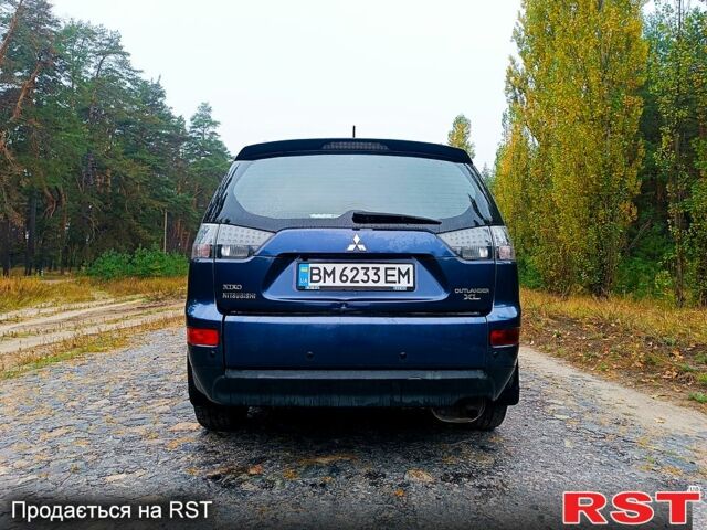 Синій Міцубісі Аутлендер, об'ємом двигуна 2.4 л та пробігом 210 тис. км за 8100 $, фото 3 на Automoto.ua