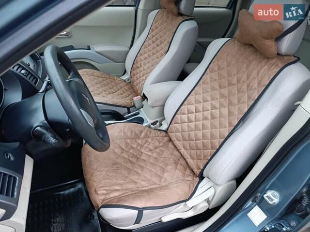 Синий Мицубиси Аутлендер, объемом двигателя 2.4 л и пробегом 264 тыс. км за 7555 $, фото 19 на Automoto.ua