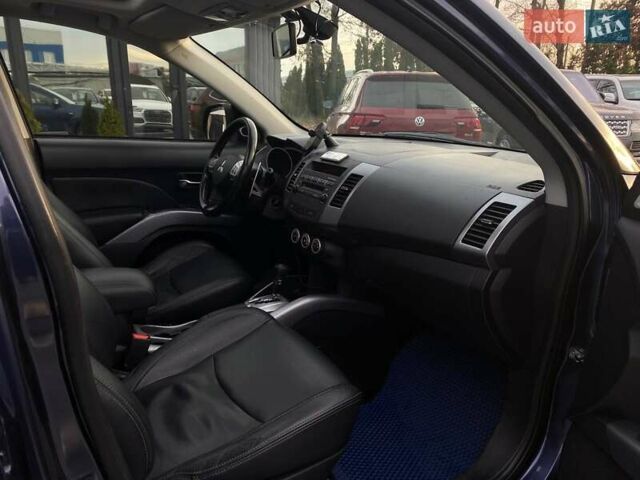 Синій Міцубісі Аутлендер, об'ємом двигуна 2.36 л та пробігом 282 тис. км за 9490 $, фото 22 на Automoto.ua