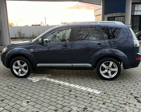 Синий Мицубиси Аутлендер, объемом двигателя 2 л и пробегом 263 тыс. км за 8900 $, фото 10 на Automoto.ua