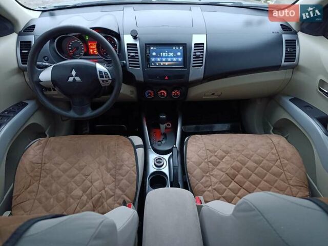 Синий Мицубиси Аутлендер, объемом двигателя 2.4 л и пробегом 264 тыс. км за 7555 $, фото 28 на Automoto.ua