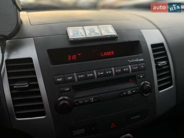 Синій Міцубісі Аутлендер, об'ємом двигуна 2.36 л та пробігом 282 тис. км за 9490 $, фото 34 на Automoto.ua