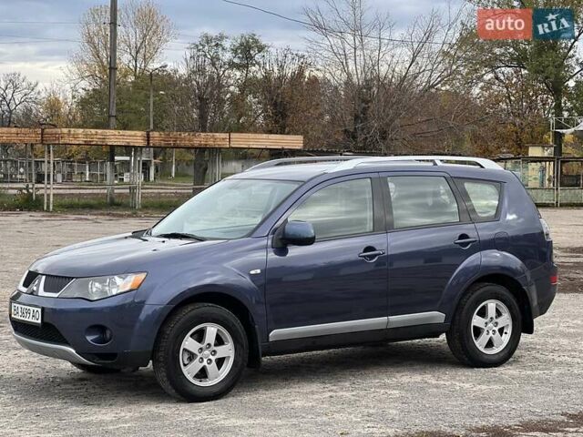 Синий Мицубиси Аутлендер, объемом двигателя 2.4 л и пробегом 94 тыс. км за 8800 $, фото 4 на Automoto.ua
