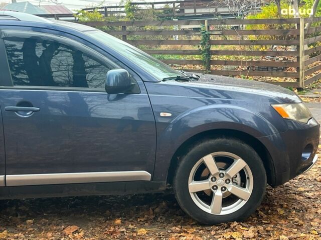 Синій Міцубісі Аутлендер, об'ємом двигуна 2.4 л та пробігом 211 тис. км за 8390 $, фото 13 на Automoto.ua