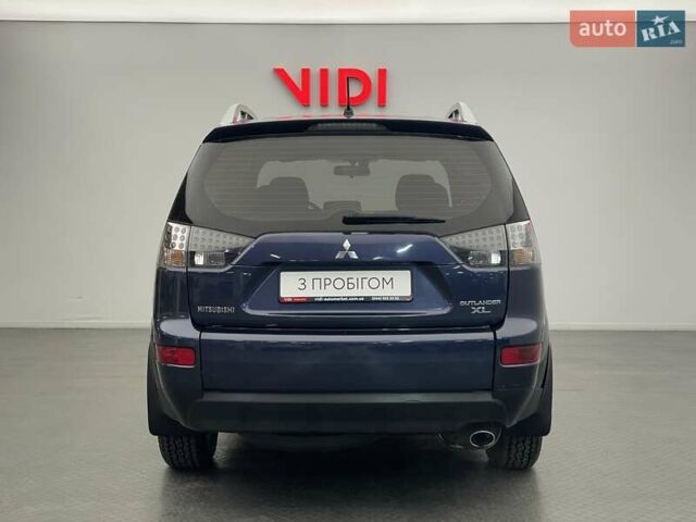 Синій Міцубісі Аутлендер, об'ємом двигуна 2.4 л та пробігом 126 тис. км за 10438 $, фото 5 на Automoto.ua