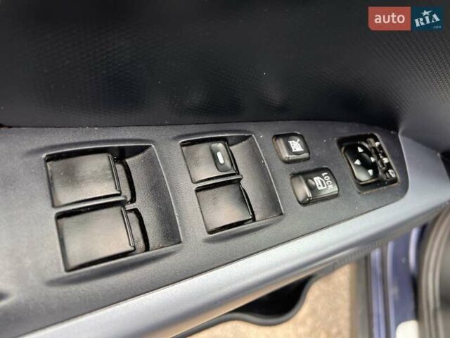 Синий Мицубиси Аутлендер, объемом двигателя 2.4 л и пробегом 94 тыс. км за 8800 $, фото 11 на Automoto.ua