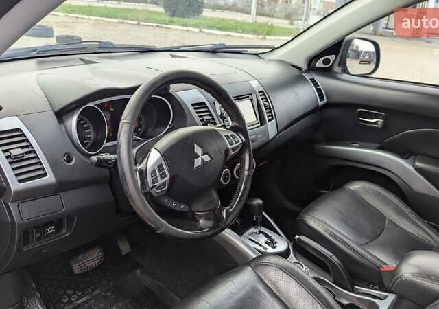 Синий Мицубиси Аутлендер, объемом двигателя 3 л и пробегом 382 тыс. км за 8200 $, фото 12 на Automoto.ua