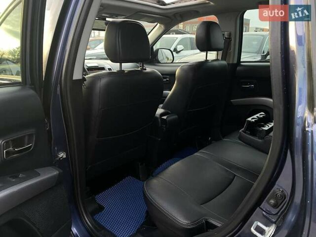 Синій Міцубісі Аутлендер, об'ємом двигуна 2.36 л та пробігом 282 тис. км за 9490 $, фото 27 на Automoto.ua