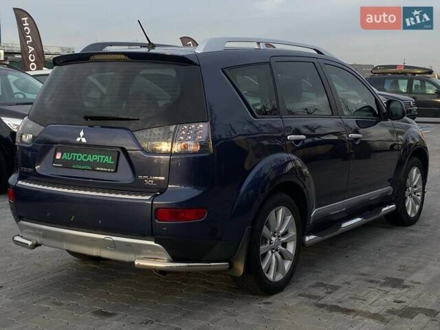 Синій Міцубісі Аутлендер, об'ємом двигуна 2.36 л та пробігом 282 тис. км за 9490 $, фото 12 на Automoto.ua