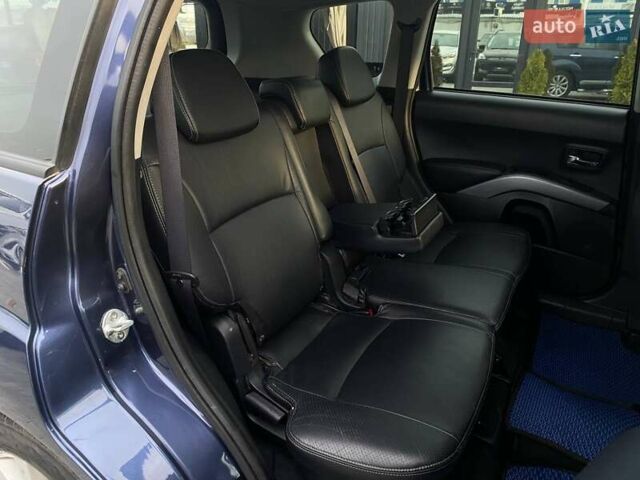 Синій Міцубісі Аутлендер, об'ємом двигуна 2.36 л та пробігом 282 тис. км за 9490 $, фото 25 на Automoto.ua