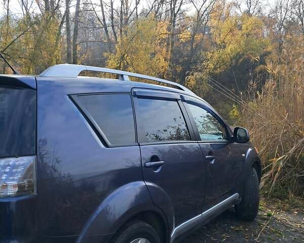 Синий Мицубиси Аутлендер, объемом двигателя 2.4 л и пробегом 160 тыс. км за 8800 $, фото 7 на Automoto.ua