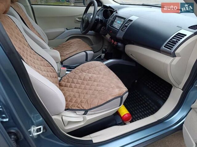 Синий Мицубиси Аутлендер, объемом двигателя 2.4 л и пробегом 264 тыс. км за 7555 $, фото 30 на Automoto.ua