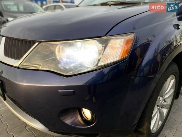 Синій Міцубісі Аутлендер, об'ємом двигуна 2.36 л та пробігом 282 тис. км за 9490 $, фото 5 на Automoto.ua