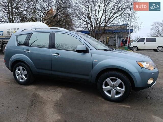Синий Мицубиси Аутлендер, объемом двигателя 2.4 л и пробегом 264 тыс. км за 7555 $, фото 8 на Automoto.ua