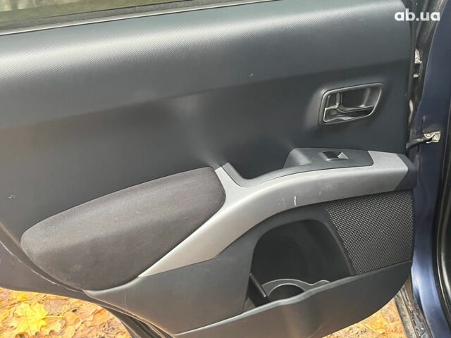 Синій Міцубісі Аутлендер, об'ємом двигуна 2.4 л та пробігом 211 тис. км за 8390 $, фото 25 на Automoto.ua