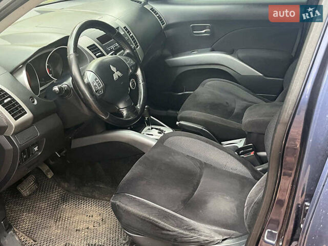 Синій Міцубісі Аутлендер, об'ємом двигуна 2.4 л та пробігом 211 тис. км за 8390 $, фото 25 на Automoto.ua