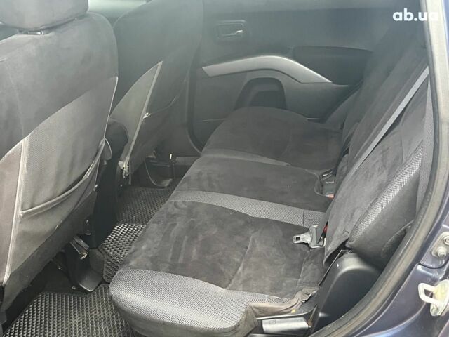 Синій Міцубісі Аутлендер, об'ємом двигуна 2.4 л та пробігом 211 тис. км за 8390 $, фото 24 на Automoto.ua