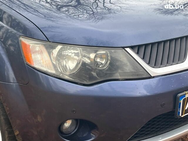 Синій Міцубісі Аутлендер, об'ємом двигуна 2.4 л та пробігом 211 тис. км за 8390 $, фото 3 на Automoto.ua