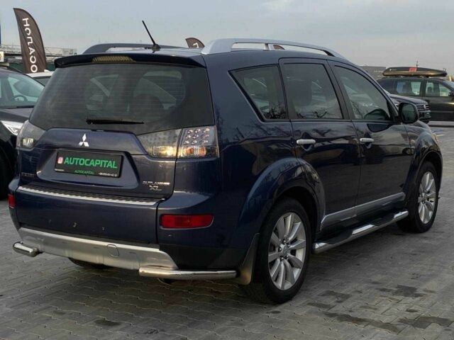 Синий Мицубиси Аутлендер, объемом двигателя 2.4 л и пробегом 282 тыс. км за 9490 $, фото 5 на Automoto.ua