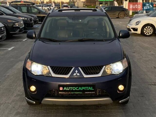 Синій Міцубісі Аутлендер, об'ємом двигуна 2.36 л та пробігом 282 тис. км за 9490 $, фото 2 на Automoto.ua