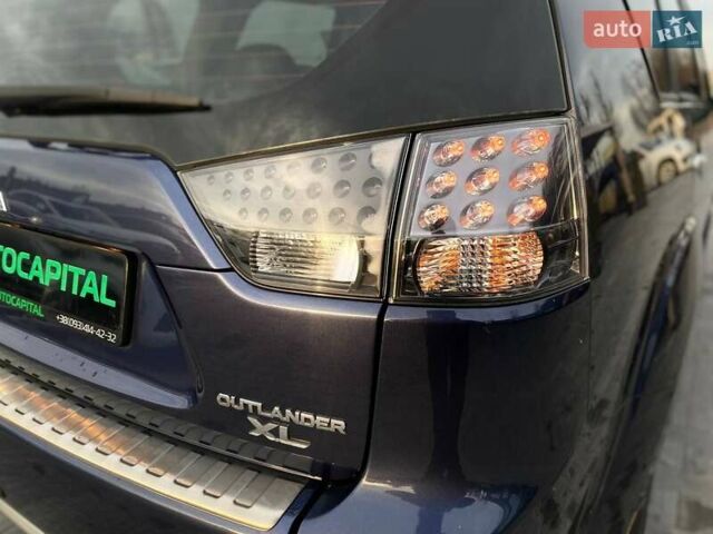Синій Міцубісі Аутлендер, об'ємом двигуна 2.36 л та пробігом 282 тис. км за 9490 $, фото 11 на Automoto.ua