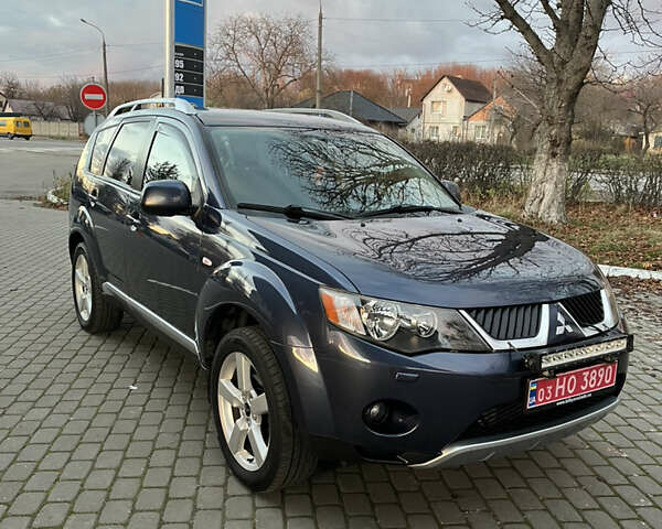 Синий Мицубиси Аутлендер, объемом двигателя 2 л и пробегом 263 тыс. км за 8900 $, фото 2 на Automoto.ua