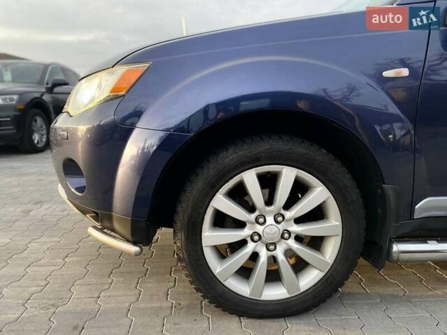 Синій Міцубісі Аутлендер, об'ємом двигуна 2.36 л та пробігом 282 тис. км за 9490 $, фото 4 на Automoto.ua