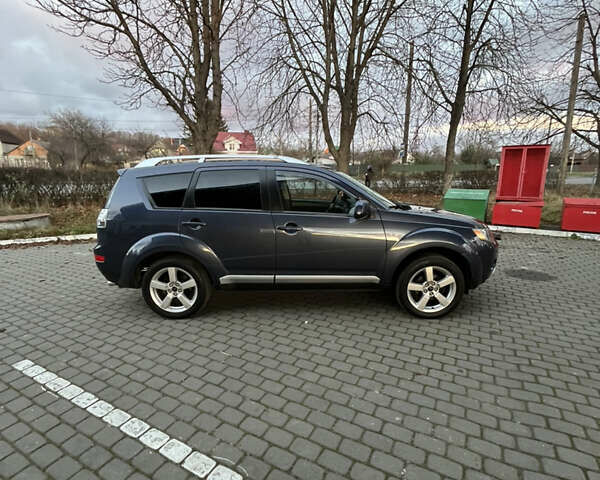 Синий Мицубиси Аутлендер, объемом двигателя 2 л и пробегом 263 тыс. км за 8900 $, фото 16 на Automoto.ua