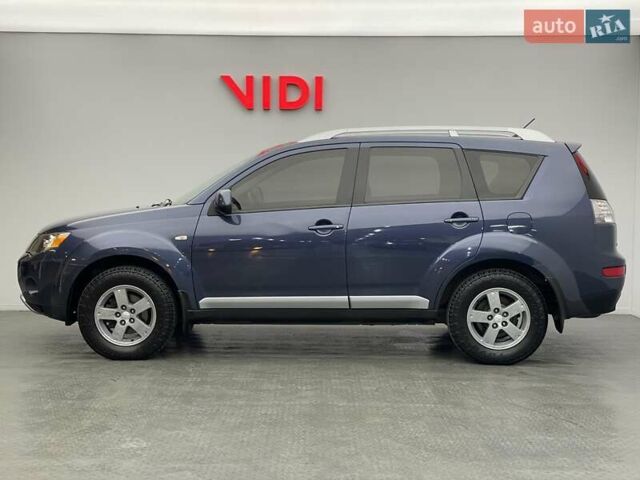 Синій Міцубісі Аутлендер, об'ємом двигуна 2.4 л та пробігом 126 тис. км за 10438 $, фото 2 на Automoto.ua